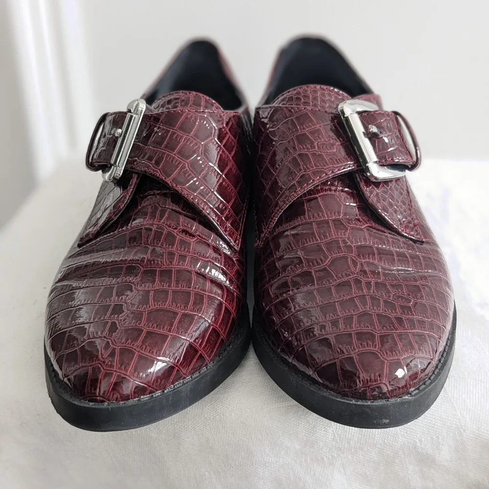 Patent leather loafers by Aldo